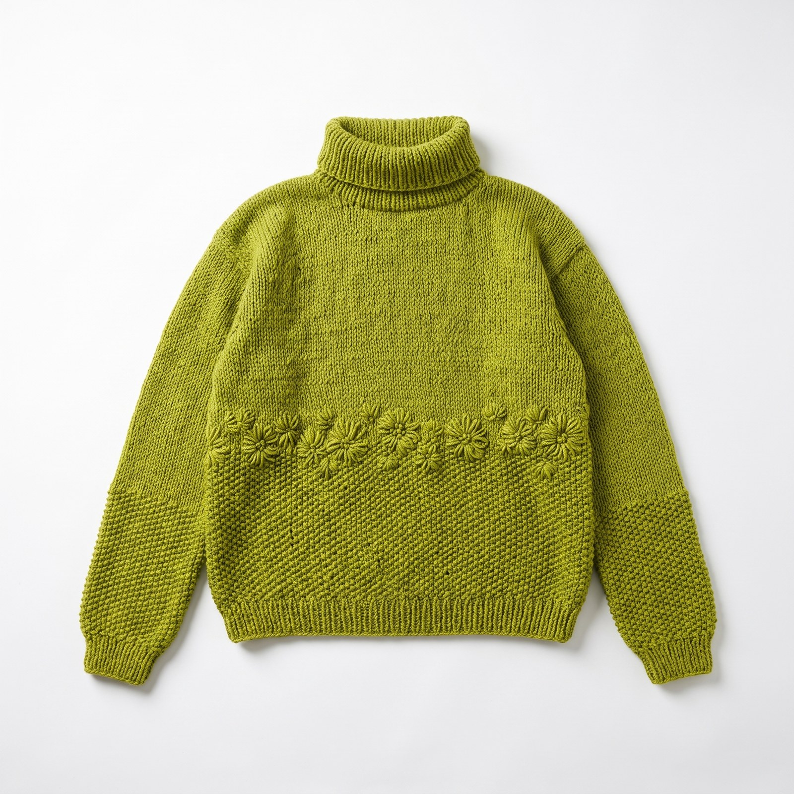 Chartreuse green hand-knit turtleneck sweater with a row of raised embroidered daisies at the waist